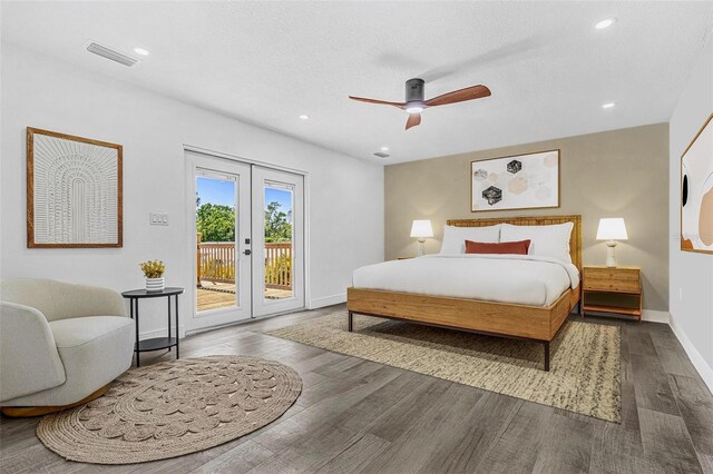 380 Colony Point Rd S, Saint Petersburg, FL 33705 - bedroom with french doors, access to outside, dark wood finished floors, recessed lighting, and a ceiling fan