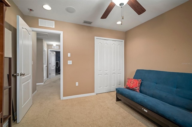 8607 Tidal Breeze Dr, Riverview, FL 33569 - living area featuring light carpet and ceiling fan