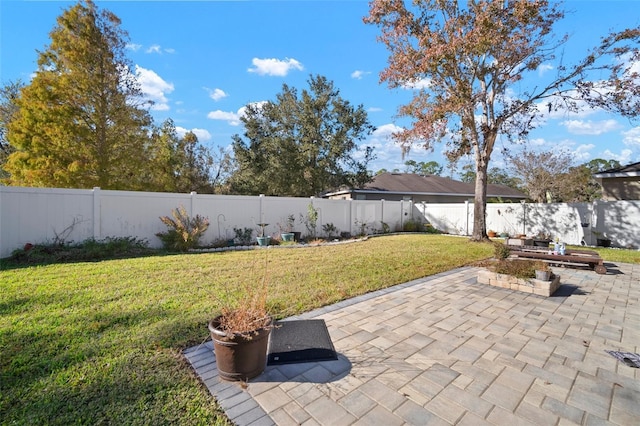 8607 Tidal Breeze Dr, Riverview, FL 33569 - fenced backyard featuring a patio area