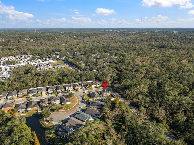 8607 Tidal Breeze Dr, Riverview, FL 33569 - aerial view of property and surrounding area featuring a heavily wooded area and nearby suburban area
