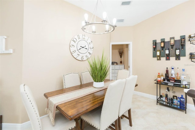 11913 Butler Woods Cir, Riverview, FL 33579 - dining space with a chandelier and baseboards