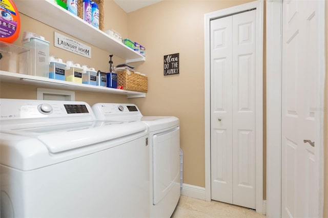 11913 Butler Woods Cir, Riverview, FL 33579 - washroom with washing machine and dryer and light tile patterned flooring