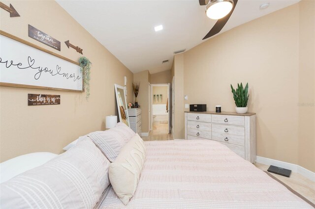 11913 Butler Woods Cir, Riverview, FL 33579 - bedroom featuring lofted ceiling and ceiling fan