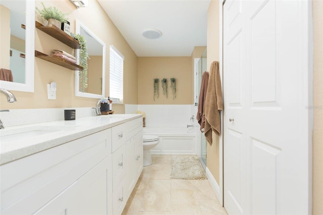 11913 Butler Woods Cir, Riverview, FL 33579 - full bathroom with double vanity, a garden tub, and tile patterned flooring