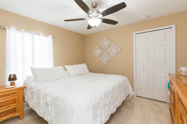 11913 Butler Woods Cir, Riverview, FL 33579 - bedroom featuring a ceiling fan and a closet