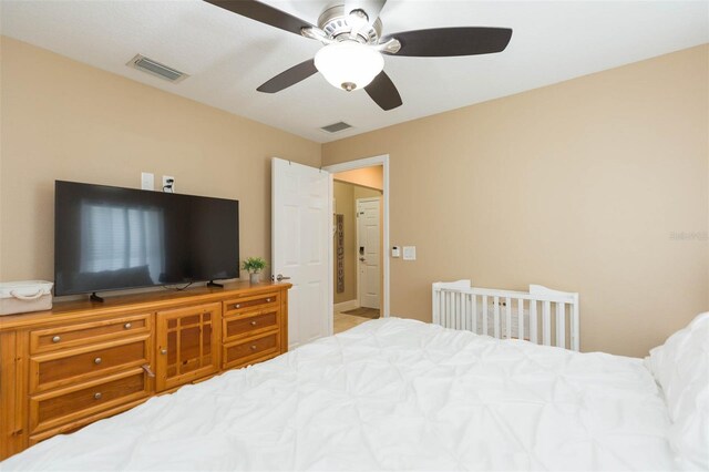 11913 Butler Woods Cir, Riverview, FL 33579 - bedroom featuring ceiling fan