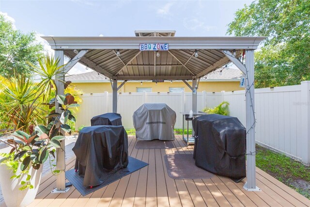 11913 Butler Woods Cir, Riverview, FL 33579 - deck with a gazebo and area for grilling