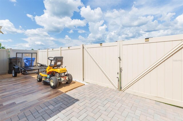 11913 Butler Woods Cir, Riverview, FL 33579 - view of patio / terrace featuring a gate