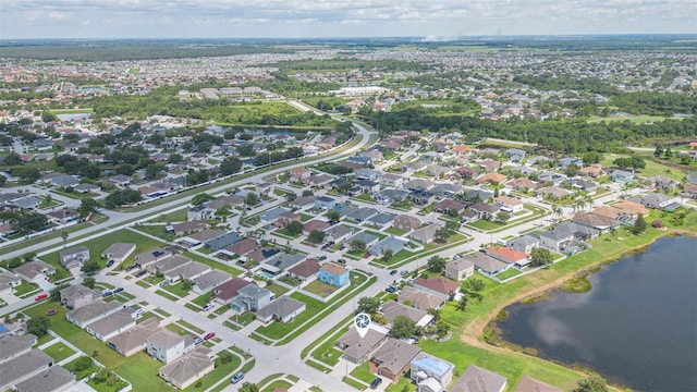 11913 Butler Woods Cir, Riverview, FL 33579 - aerial overview of property's location with a large body of water and nearby suburban area