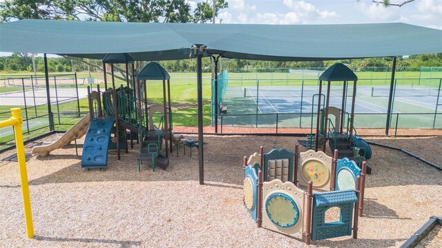 11913 Butler Woods Cir, Riverview, FL 33579 - communal playground featuring a tennis court