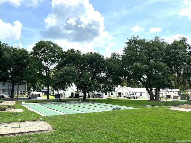 6847 E Queensbury Ln, Inverness, FL 34452 - view of property's community with a yard and shuffleboard