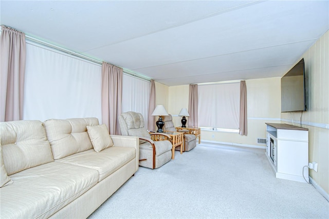 35014 Carl Ave, Zephyrhills, FL 33541 - living room with light colored carpet and baseboards