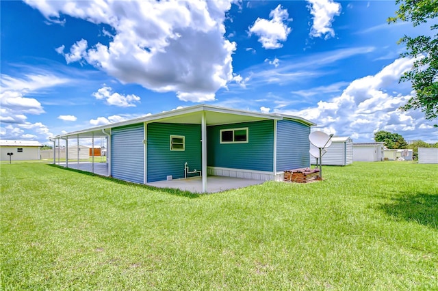 35014 Carl Ave, Zephyrhills, FL 33541 - rear view of property featuring a patio area and a lawn