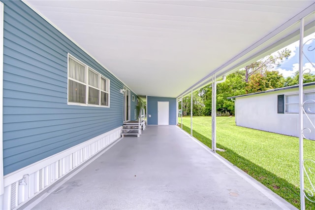 35014 Carl Ave, Zephyrhills, FL 33541 - view of patio featuring a carport