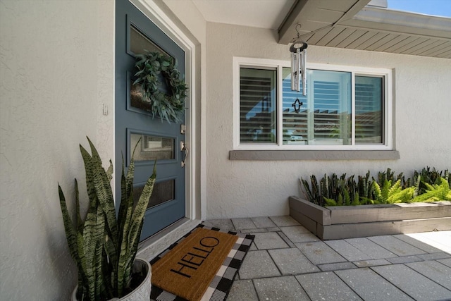 11763 Saree Ct, Largo, FL 33778 - doorway to property with stucco siding