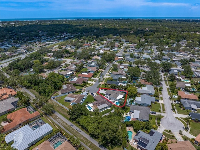 11763 Saree Ct, Largo, FL 33778 - aerial view of property and surrounding area featuring nearby suburban area and property boundaries highlighted