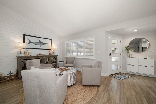 11763 Saree Ct, Largo, FL 33778 - living area with wood finished floors and lofted ceiling