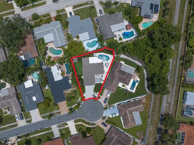 11763 Saree Ct, Largo, FL 33778 - aerial view of residential area featuring a pool and property parcel outlined