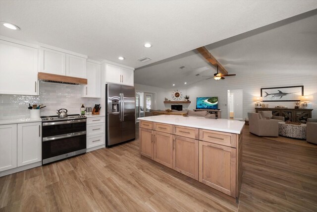 11763 Saree Ct, Largo, FL 33778 - kitchen with stainless steel appliances, premium range hood, open floor plan, light countertops, and recessed lighting