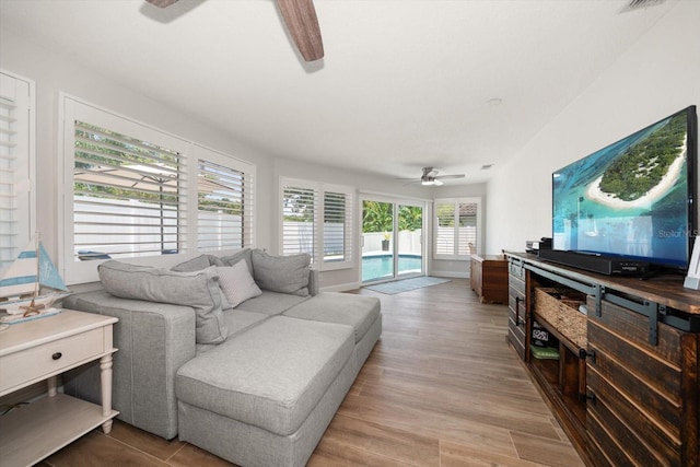 11763 Saree Ct, Largo, FL 33778 - living room featuring a ceiling fan and wood finished floors