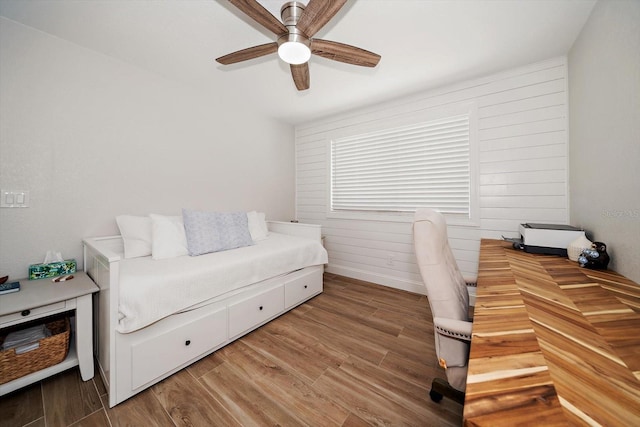 11763 Saree Ct, Largo, FL 33778 - office with a ceiling fan, wood finished floors, and wood walls