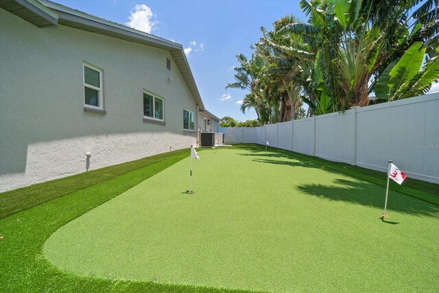 11763 Saree Ct, Largo, FL 33778 - fenced backyard with a putting green