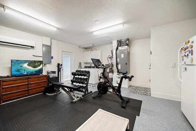 11763 Saree Ct, Largo, FL 33778 - exercise area with attic access, electric panel, a wall mounted AC, a textured ceiling, and electric water heater