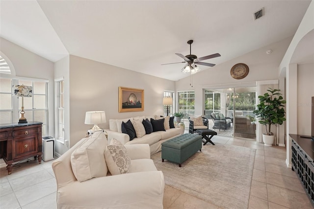 3854 Lyndhurst Ct, Sarasota, FL 34235 - living area with vaulted ceiling, ceiling fan, and light tile patterned flooring