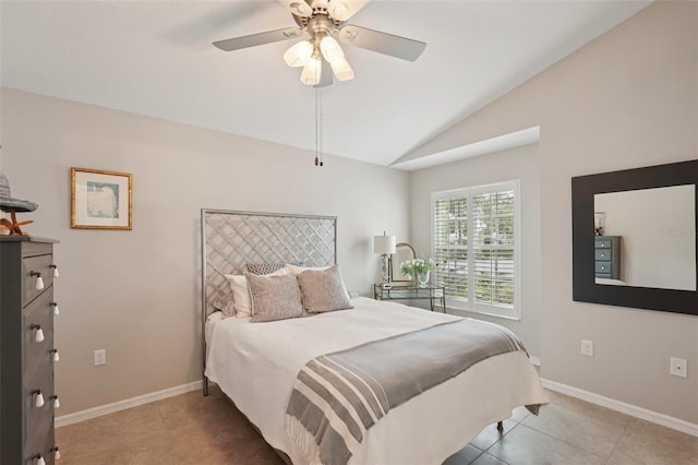 3854 Lyndhurst Ct, Sarasota, FL 34235 - bedroom featuring vaulted ceiling, light tile patterned floors, and a ceiling fan