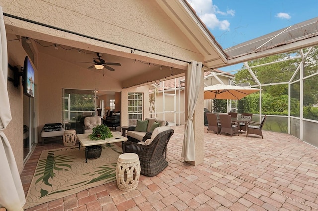 3854 Lyndhurst Ct, Sarasota, FL 34235 - view of patio / terrace with a ceiling fan, outdoor dining area, outdoor lounge area, and glass enclosure