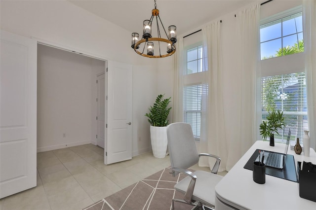 955 Signet Dr, Apollo Beach, FL 33572 - home office featuring plenty of natural light, a chandelier, and light tile patterned floors