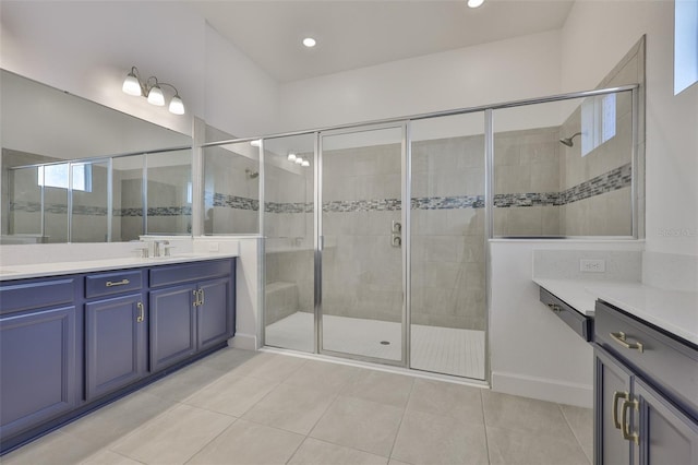 955 Signet Dr, Apollo Beach, FL 33572 - full bath featuring vanity, a shower stall, tile patterned floors, and recessed lighting