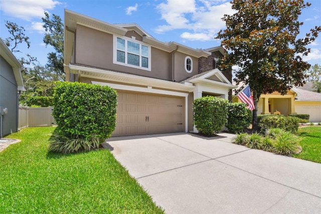 3530 Brook Crossing Dr, Brandon, FL 33511 - traditional-style house with concrete driveway, stucco siding, and an attached garage