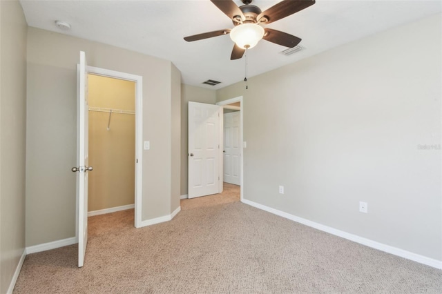 3530 Brook Crossing Dr, Brandon, FL 33511 - unfurnished bedroom with carpet, a spacious closet, a closet, and a ceiling fan