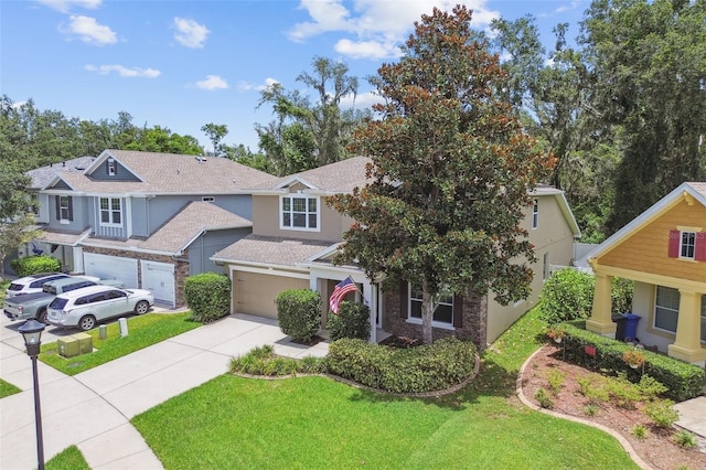 3530 Brook Crossing Dr, Brandon, FL 33511 - view of front of property with stucco siding, driveway, and a front lawn