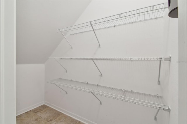 3530 Brook Crossing Dr, Brandon, FL 33511 - walk in closet featuring vaulted ceiling