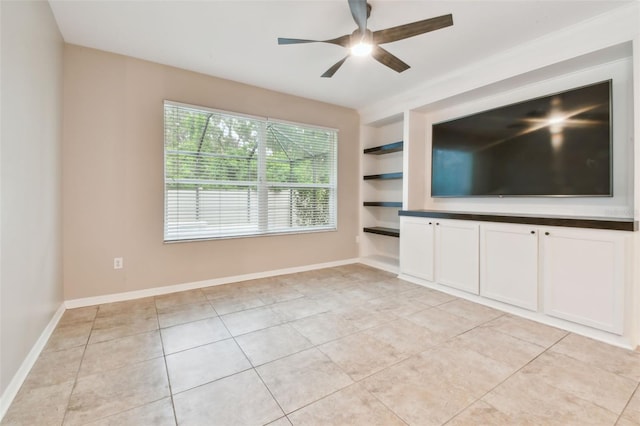 3530 Brook Crossing Dr, Brandon, FL 33511 - unfurnished living room with built in shelves, ceiling fan, and light tile patterned flooring