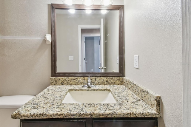 3530 Brook Crossing Dr, Brandon, FL 33511 - bathroom with vanity and a textured wall