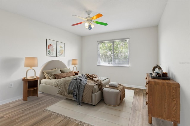 25737 Frith St, Land O Lakes, FL 34639 - bedroom featuring light wood finished floors and a ceiling fan