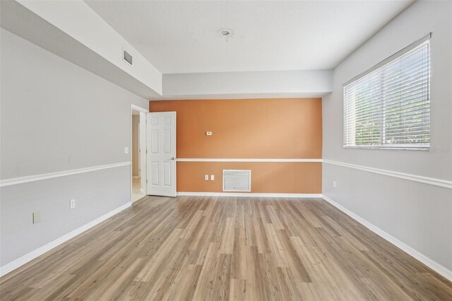25737 Frith St, Land O Lakes, FL 34639 - unfurnished room with light wood-type flooring and baseboards