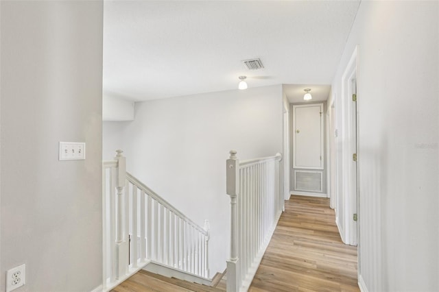 25737 Frith St, Land O Lakes, FL 34639 - hallway featuring an upstairs landing and light wood finished floors