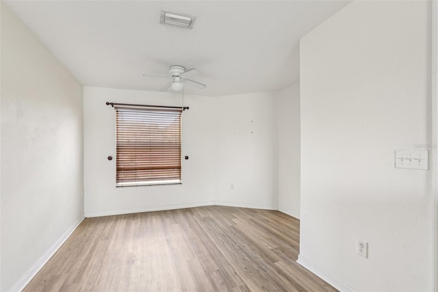 25737 Frith St, Land O Lakes, FL 34639 - unfurnished room featuring light wood-style flooring and a ceiling fan