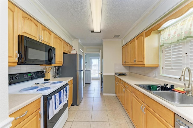 1908 N Brink Ave, Sarasota, FL 34234 - kitchen featuring black microwave, range with electric stovetop, a textured ceiling, decorative backsplash, and crown molding