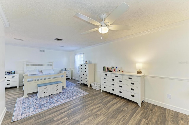 1908 N Brink Ave, Sarasota, FL 34234 - bedroom featuring ornamental molding, a textured ceiling, wood finished floors, and ceiling fan