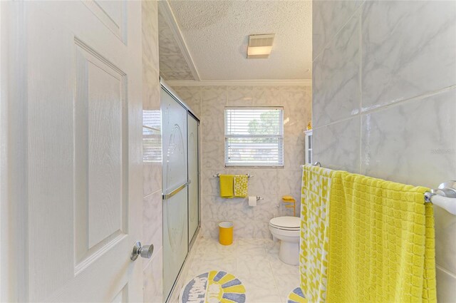 1908 N Brink Ave, Sarasota, FL 34234 - bathroom with an enclosed shower, a textured ceiling, ornamental molding, and tile walls