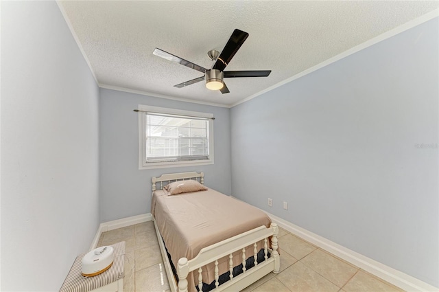 1908 N Brink Ave, Sarasota, FL 34234 - bedroom with crown molding, light tile patterned floors, a textured ceiling, and ceiling fan