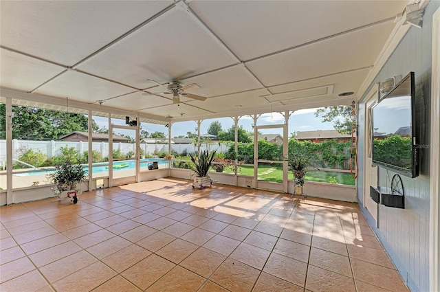 1908 N Brink Ave, Sarasota, FL 34234 - unfurnished sunroom featuring a ceiling fan