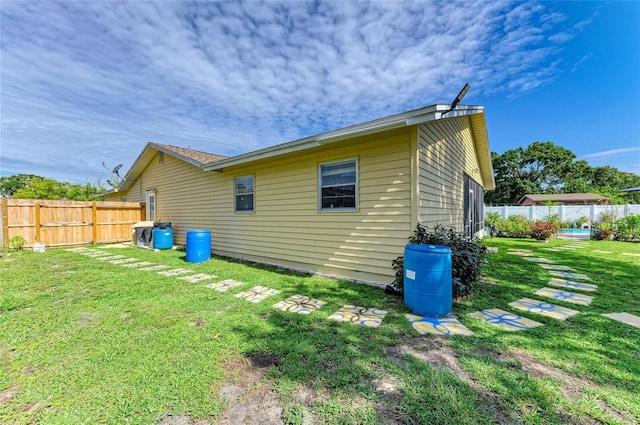 1908 N Brink Ave, Sarasota, FL 34234 - back of house featuring a fenced backyard and a swimming pool