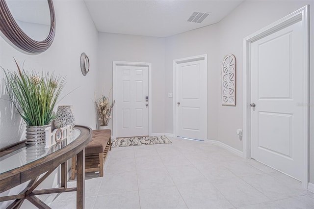 13527 Willow Bluestar Loop, Riverview, FL 33579 - entrance foyer featuring light tile patterned floors and baseboards