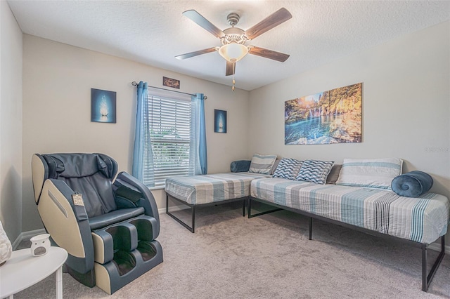 13527 Willow Bluestar Loop, Riverview, FL 33579 - living area featuring carpet, a ceiling fan, and a textured ceiling